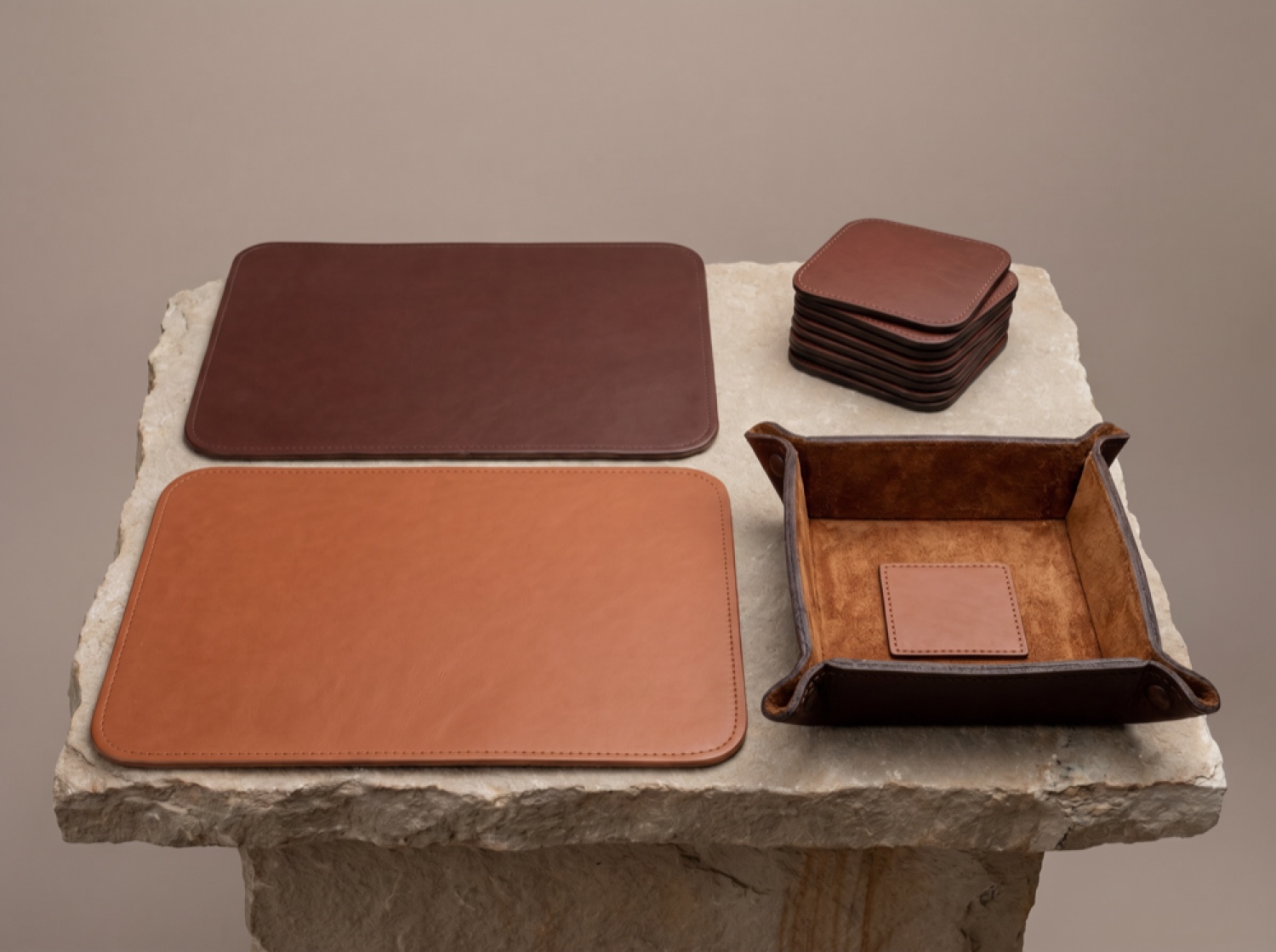 Bandera home & office leather goods on a stone studio surface